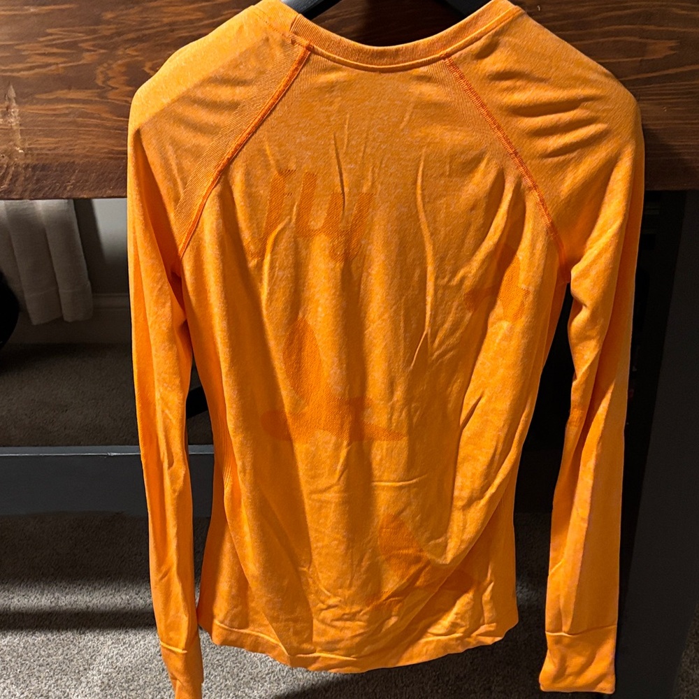 Oiselle women’s Orange Long Sleeve running Shirt - fly / birds